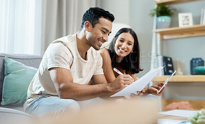 Buy stock photo Happy couple, documents and budget planning on sofa in finance, expenses or bills together at home. Man and woman smile with paperwork in living room for loan, financial plan or insurance at house