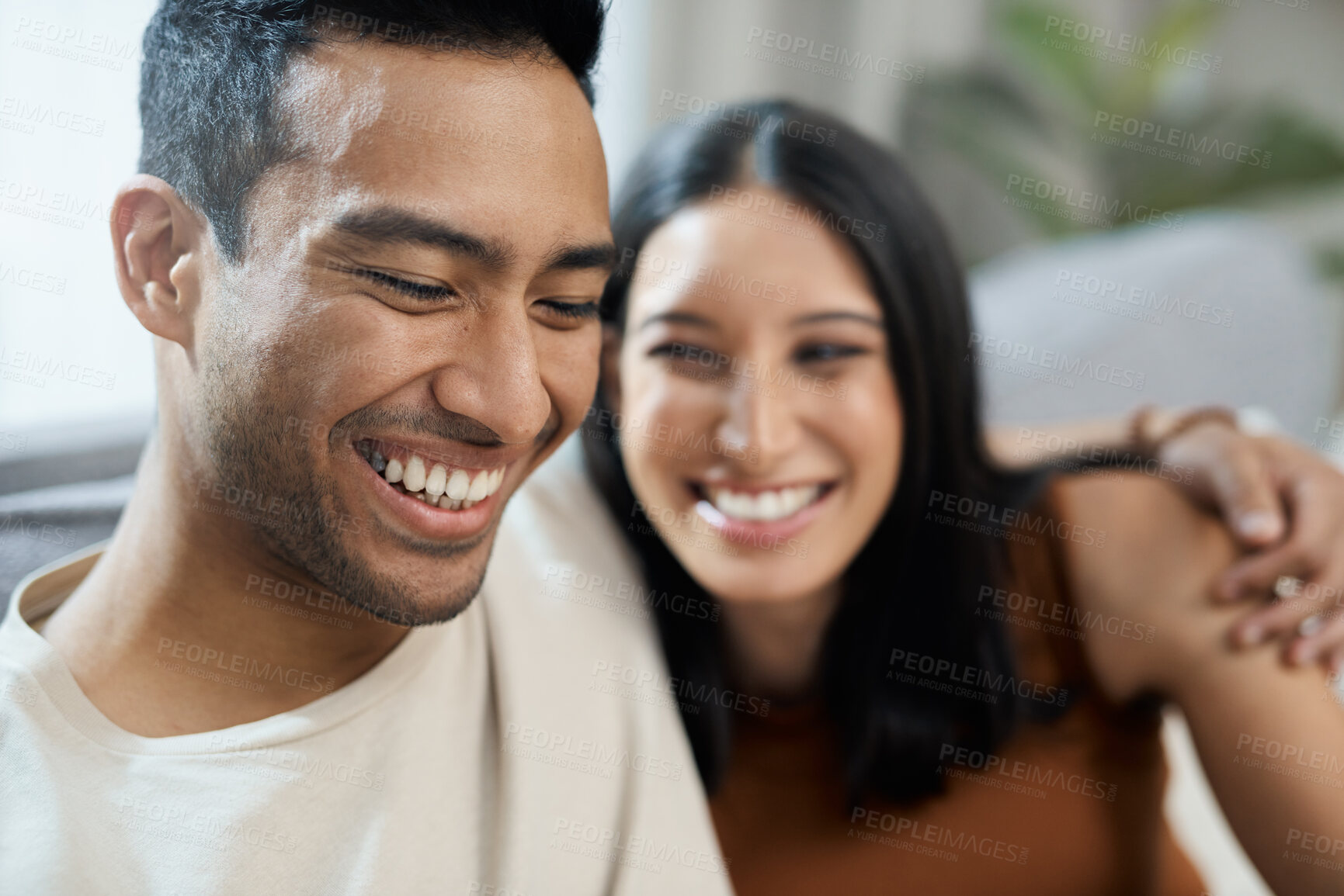 Buy stock photo Couple, face and happy on sofa with love, bonding and relax for relationship in living room of home. Care, woman and man with smile on couch in lounge of house for peace, embrace and freedom or laugh