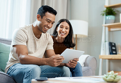 Buy stock photo Happy couple, tablet and social media on sofa in house for financial planning, budget or savings. Man, woman and smile for deal, offer or announcement with technology by internet, mobile app or web