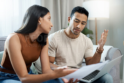 Buy stock photo Frustrated couple, laptop and financial crisis in debt, mistake or argument on living room sofa at home. Man and woman with computer in disagreement for finance, mortgage expenses and bills at house