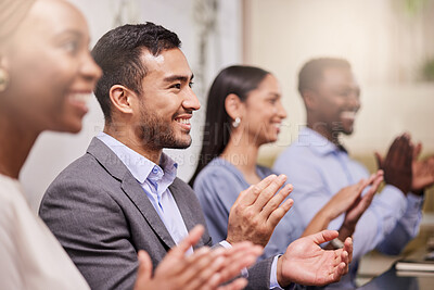 Buy stock photo Shot of a team of work colleagues giving applause during a business meeting