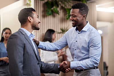 Buy stock photo Shot of two businessmen shaking hands in greeting