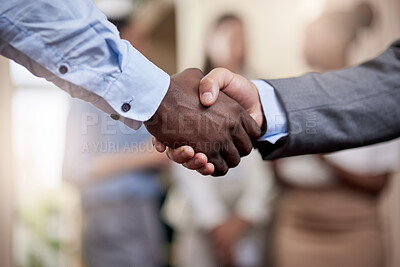 Buy stock photo Shot of two businessmen shaking hands in greeting