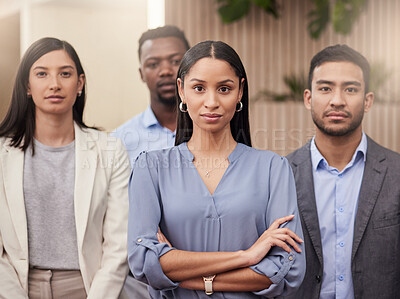 Buy stock photo Shot of a group of young businesspeople together in their office