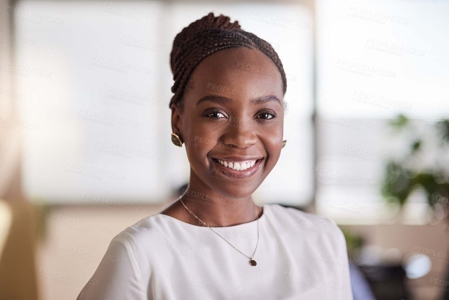 Buy stock photo Shot of a beautiful young businesswoman in her office