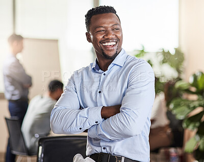 Buy stock photo Shot of a young businessman in his office