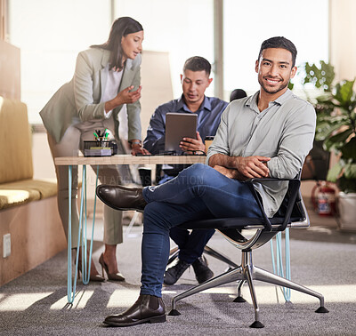 Buy stock photo Shot of a young businessman in his office