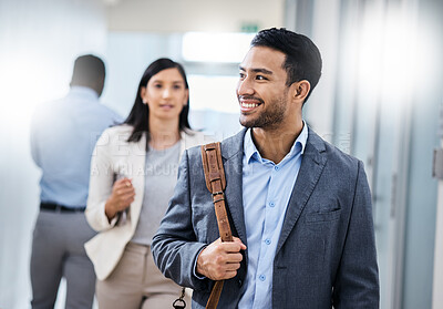 Buy stock photo Shot of businesspeople walking through an office