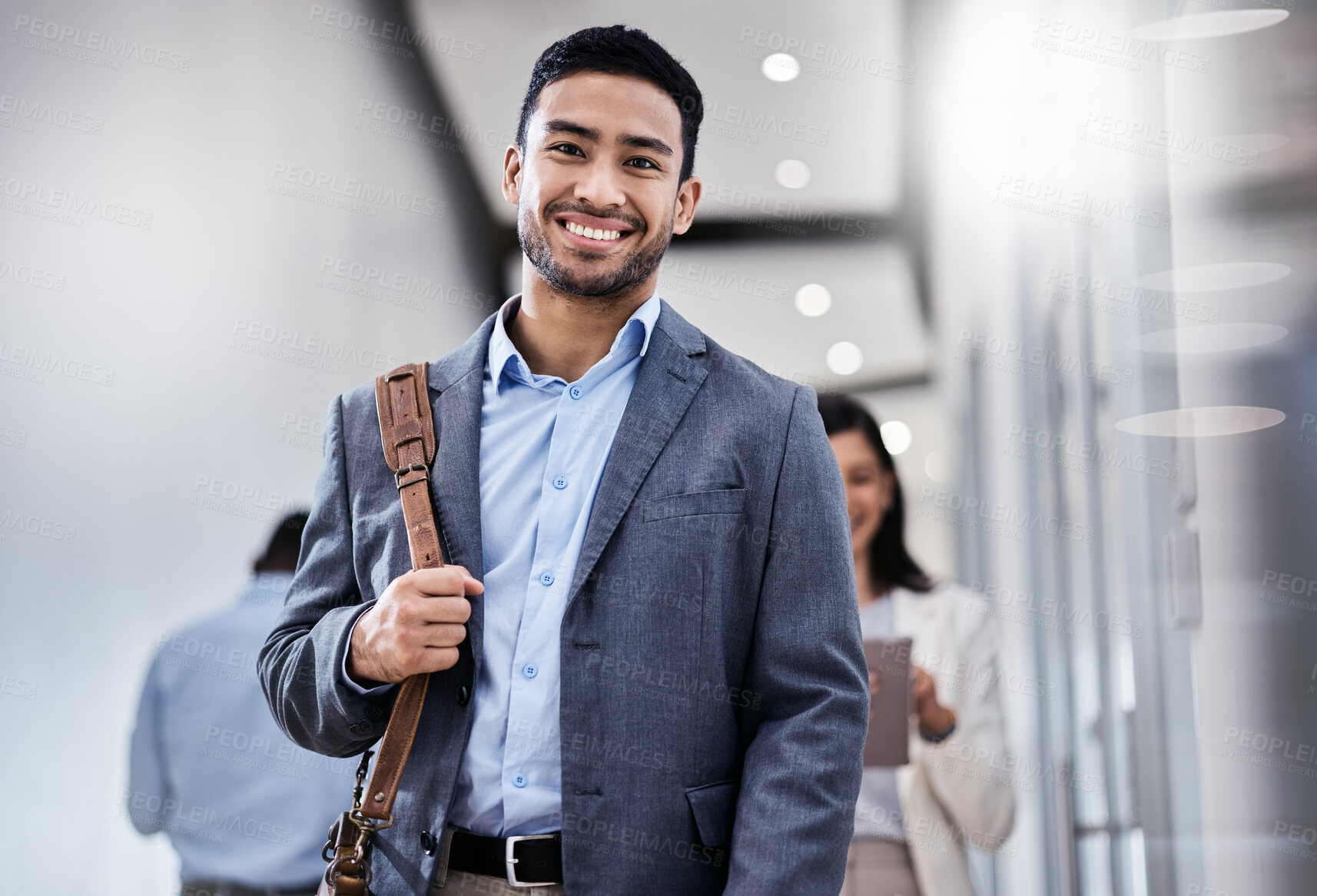 Buy stock photo Shot of a business smiling while walking through the office