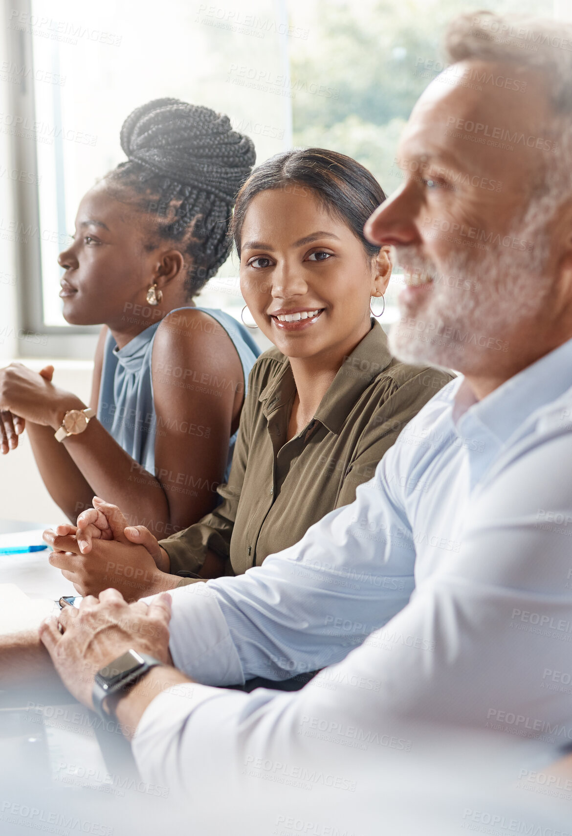 Buy stock photo Shot of a young businesswoman in a meeting at work