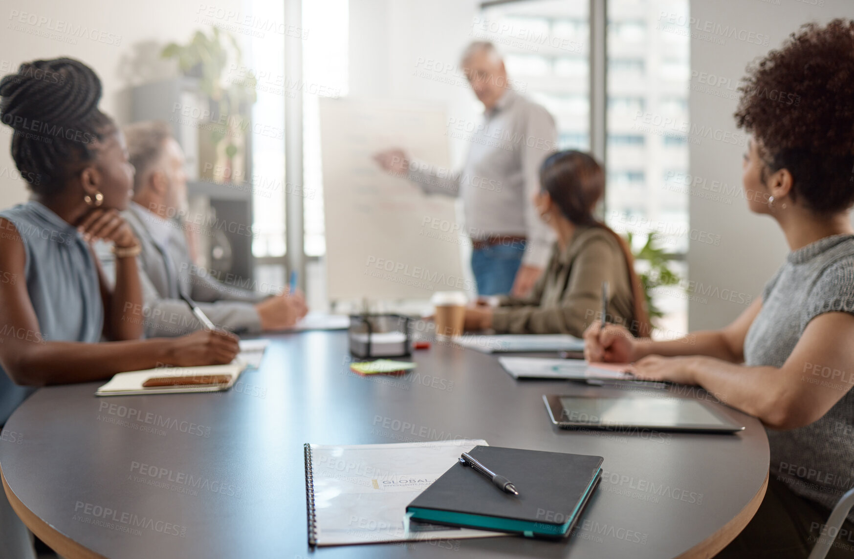 Buy stock photo Boardroom, presentation and team with notebook in meeting, listen or planning for global investment. Corporate treasurer, speech and people with paperwork for collaboration and business development