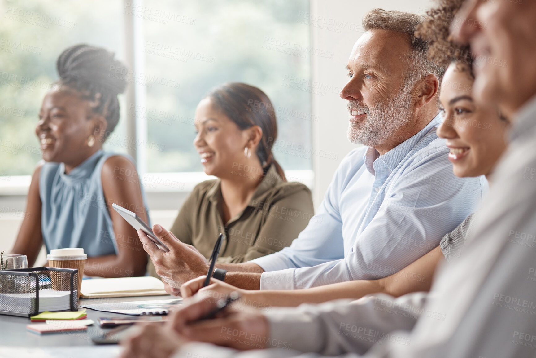 Buy stock photo Shot of a group of businesspeople clapping hands in a boardroom at work