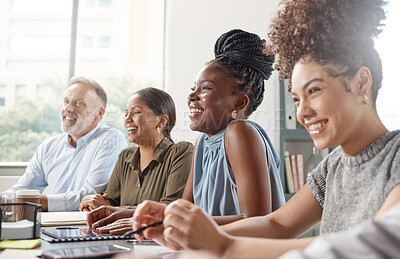 Buy stock photo Shot of a group of businesspeople in a meeting at work