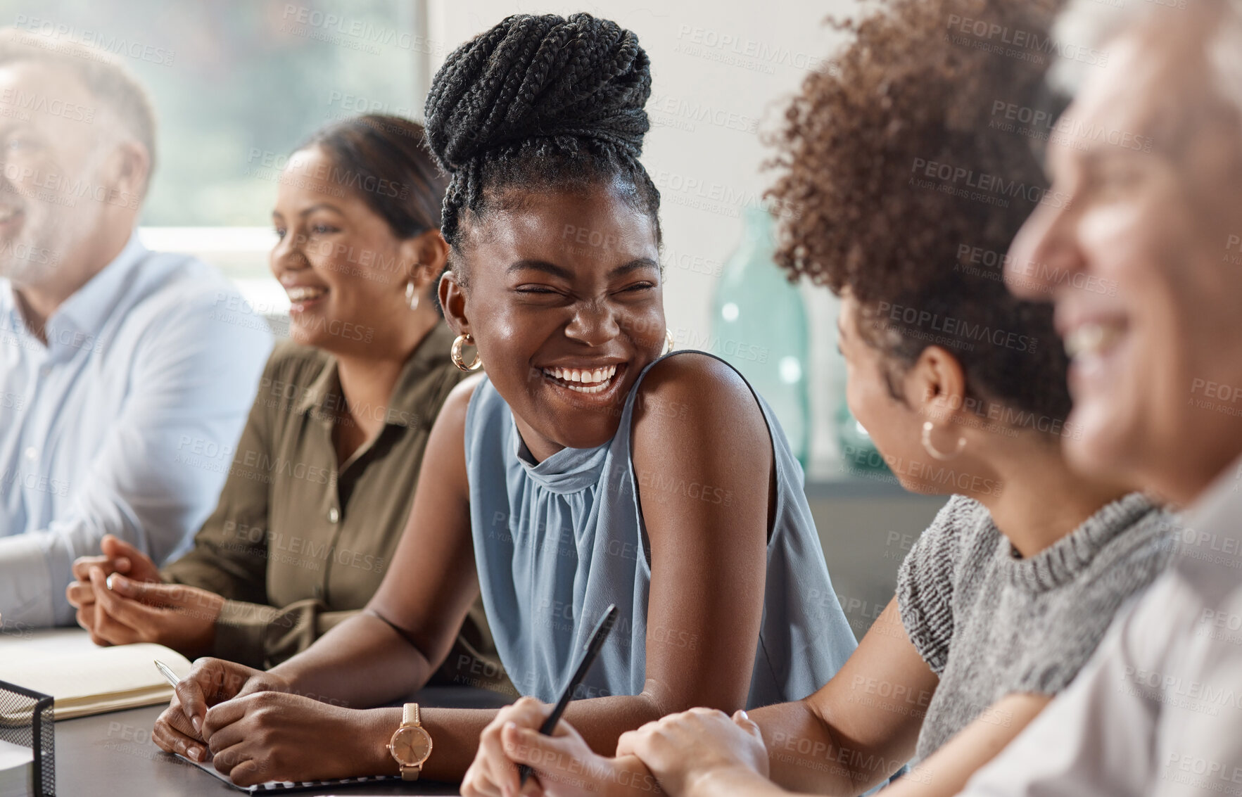 Buy stock photo Shot of a group of businesspeople in a meeting at work