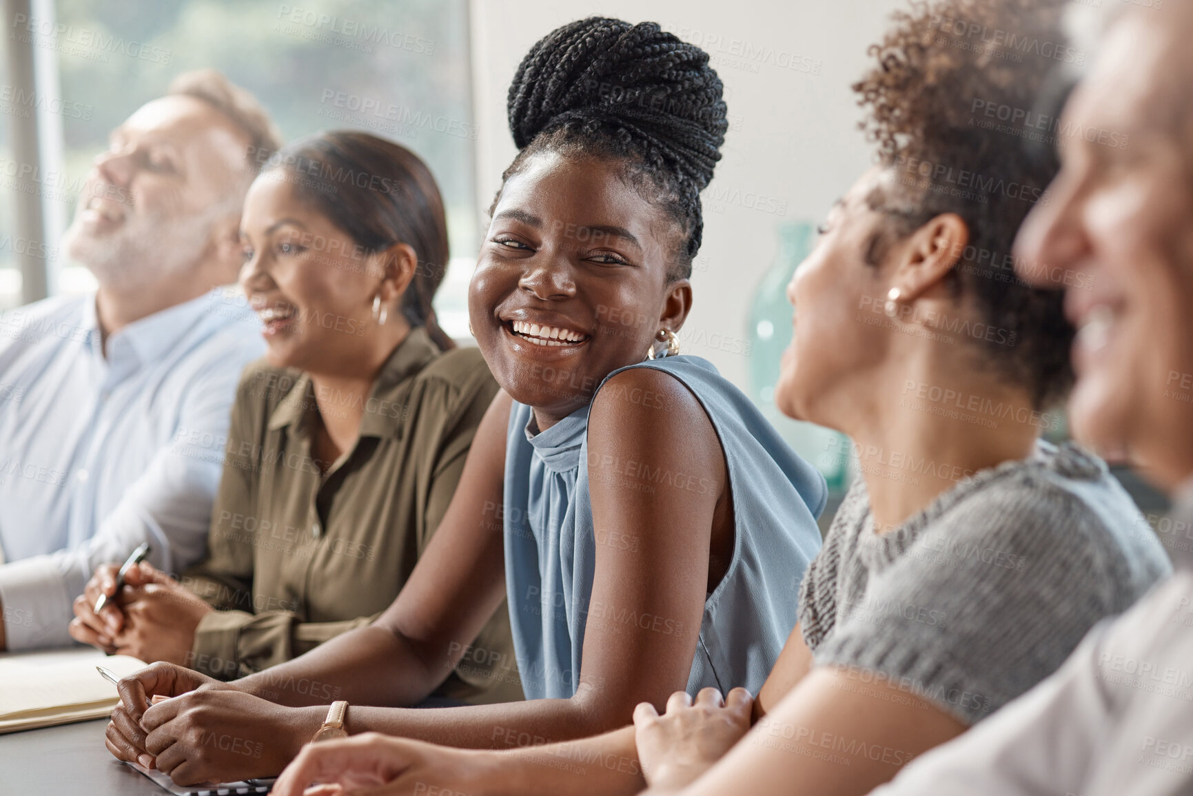 Buy stock photo Shot of a group of businesspeople in a meeting at work