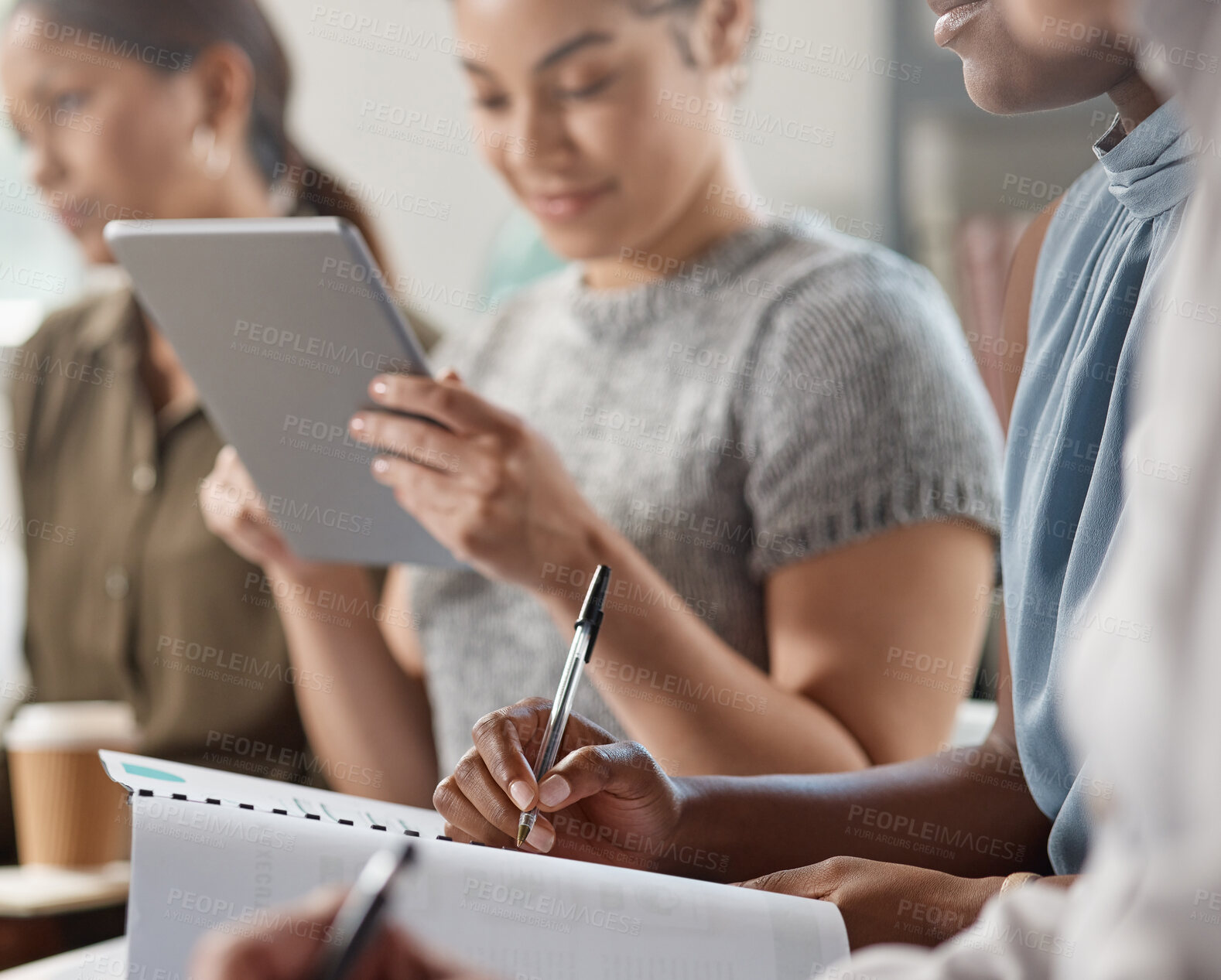 Buy stock photo Shot of an unrecognizable businessperson writing in a notebook at work