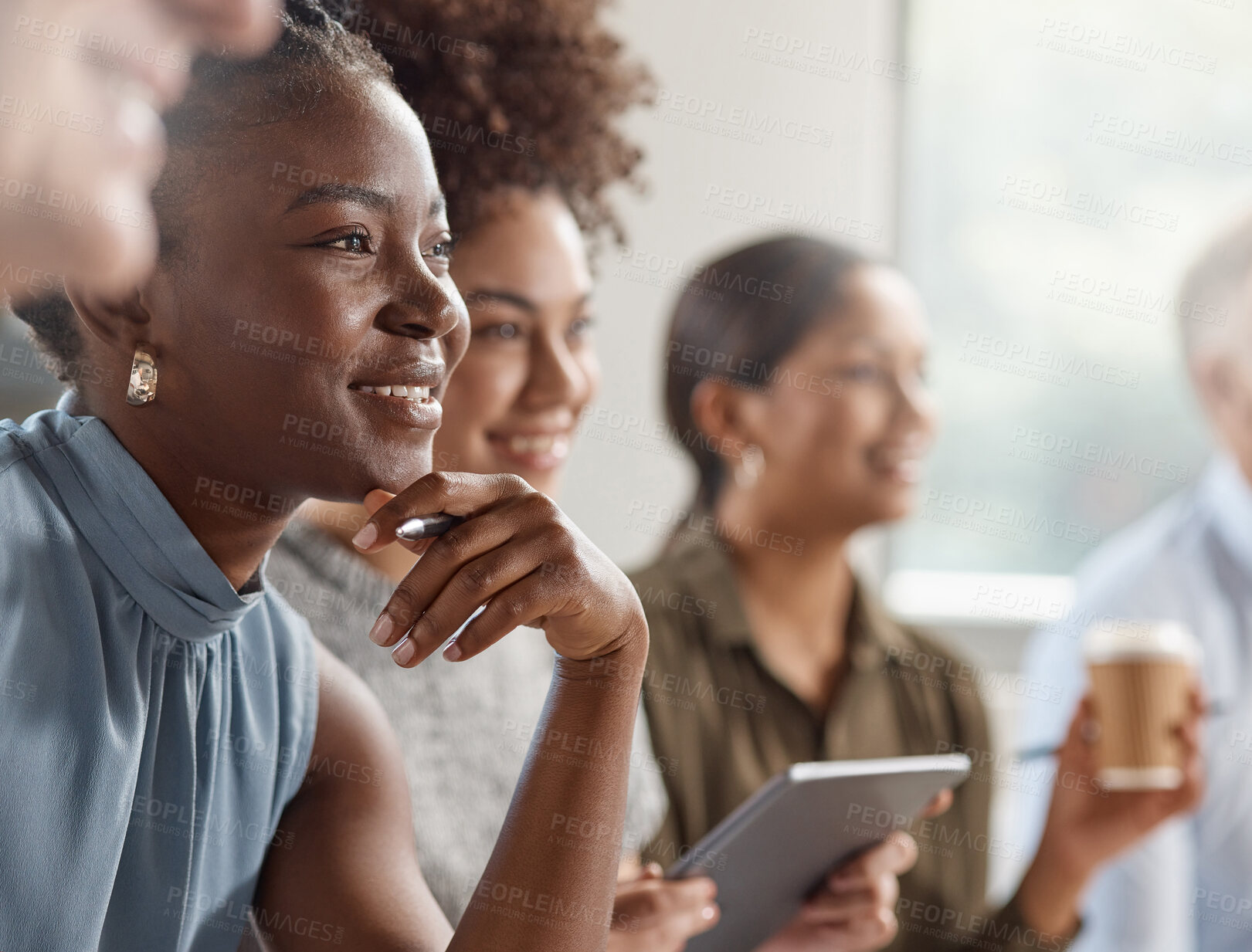 Buy stock photo Shot of a group of businesspeople in a meeting at work