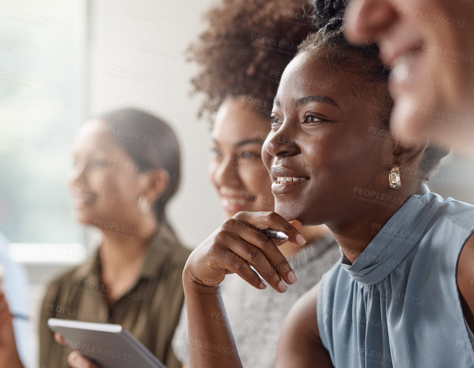 Buy stock photo Shot of a group of businesspeople in a meeting at work