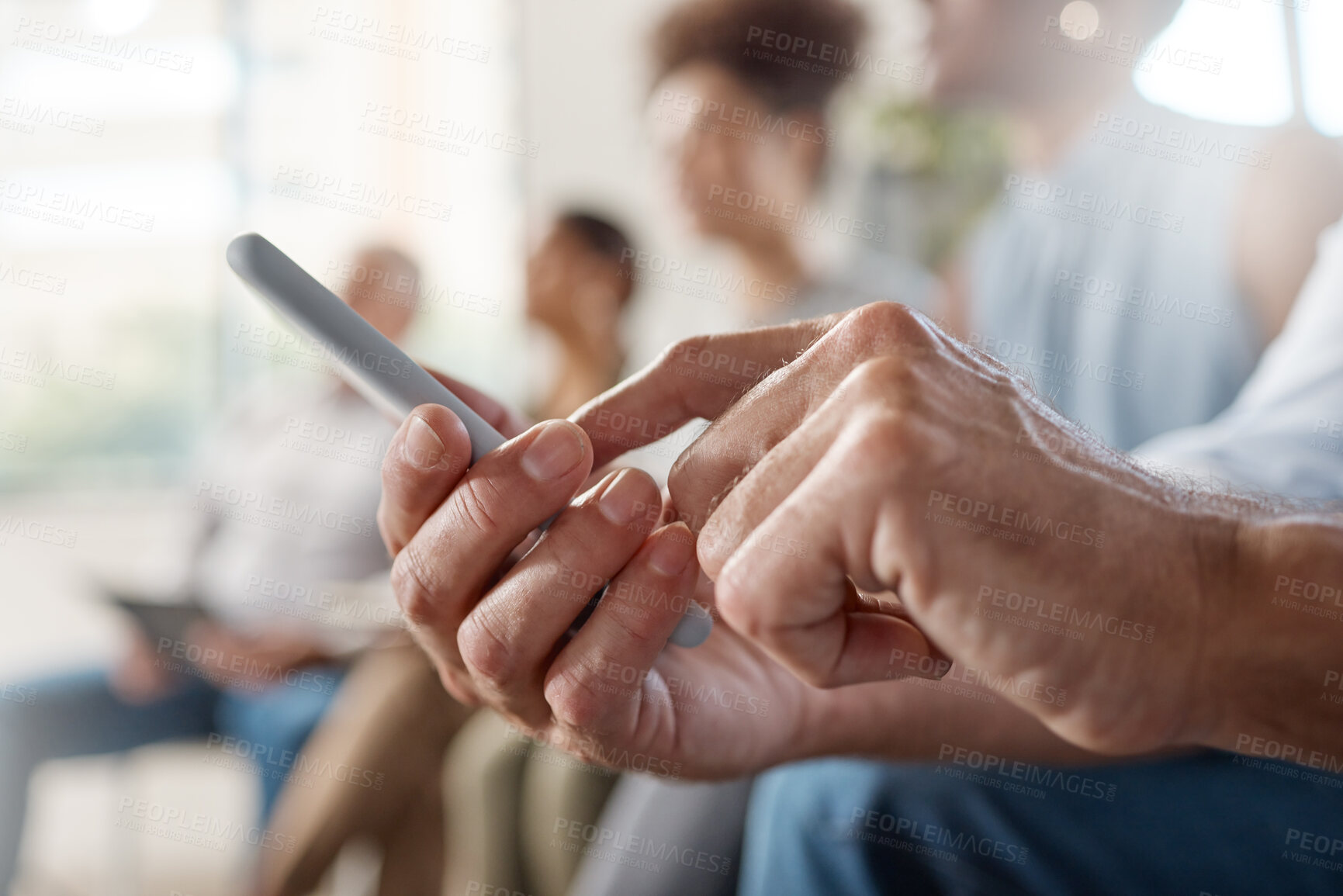 Buy stock photo Shot of an unrecognizable businessperson using a phone at work