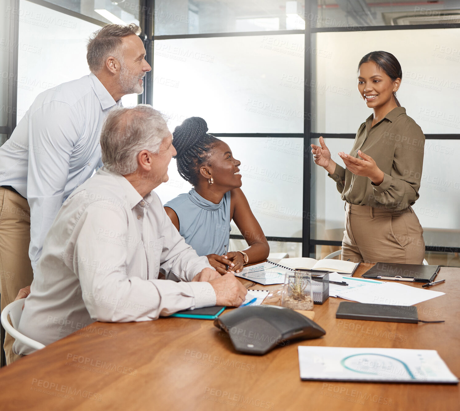 Buy stock photo Shot of a group of businesspeople in a meeting at work