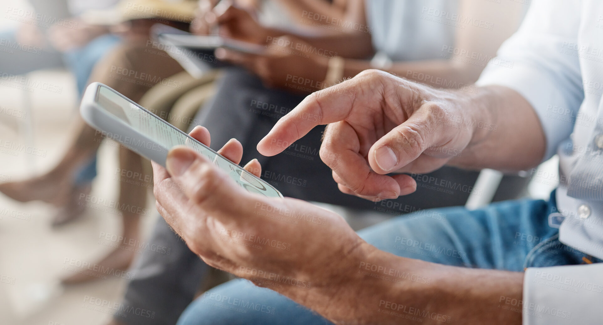 Buy stock photo Shot of an unrecognizable businessperson using a phone at work