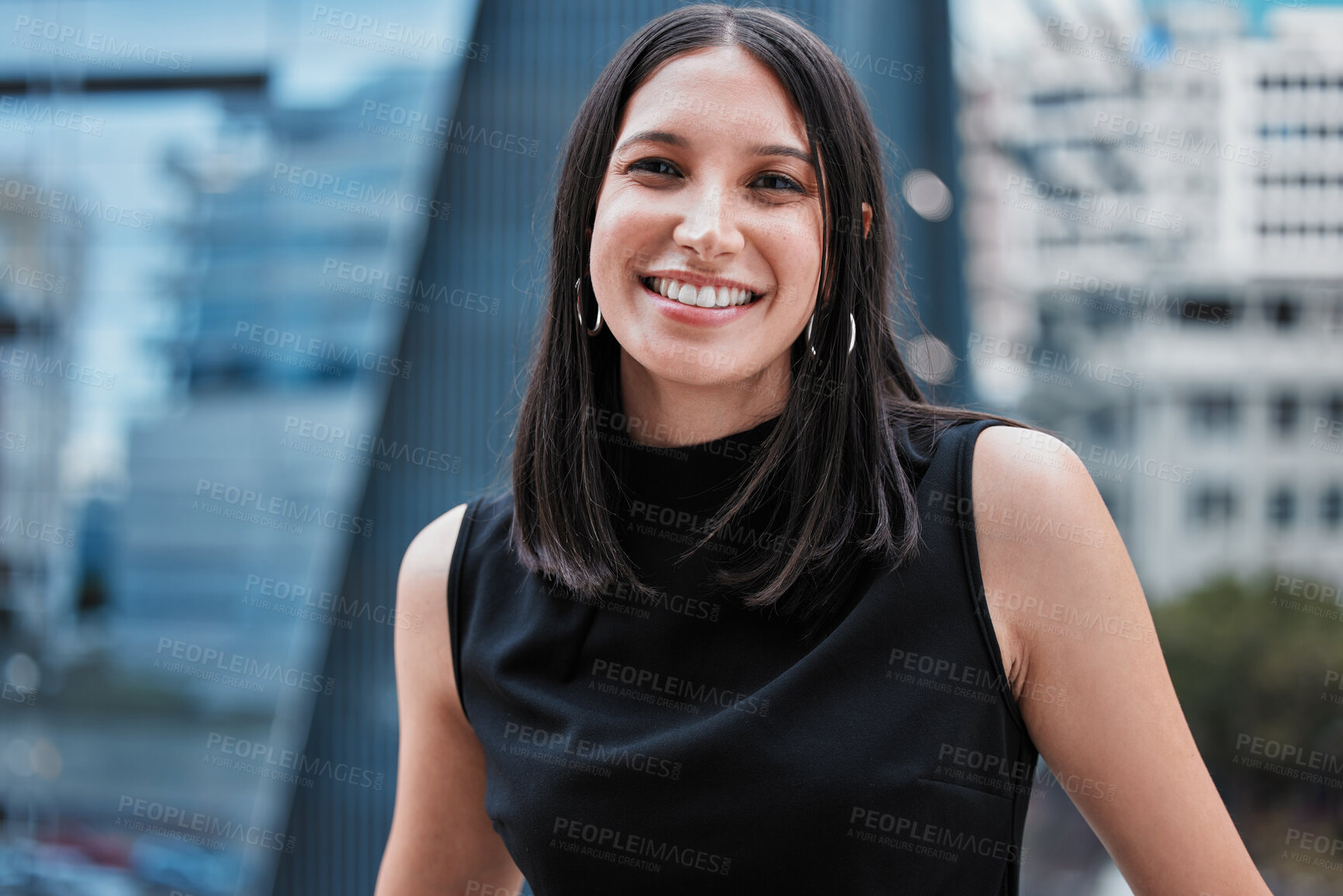 Buy stock photo Cropped portrait of an attractive young businesswoman standing outside on the office balcony