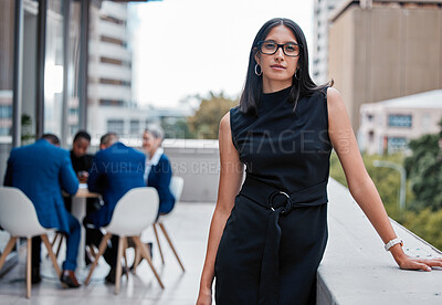 Buy stock photo Cropped portrait of an attractive young businesswoman standing outside on the office balcony