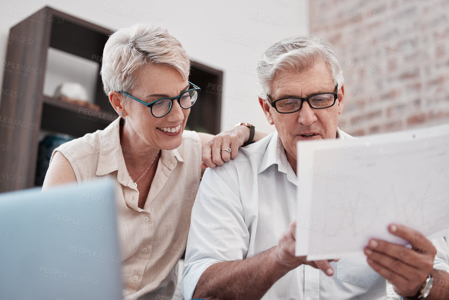 Buy stock photo Senior couple, laptop and document for financial planning, savings and taxes in home. Retirement, paperwork and happy man and woman with invoice, pension or insurance, finance and asset management.