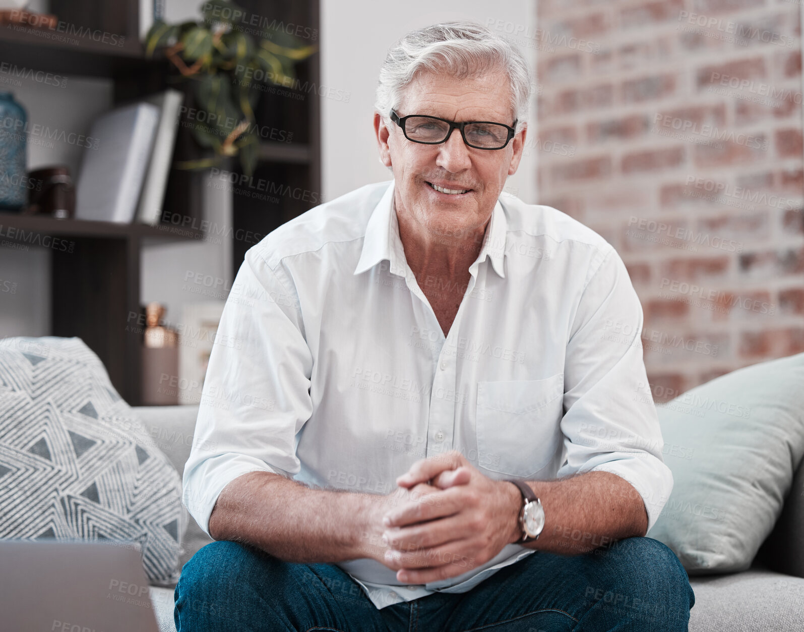 Buy stock photo Portrait, mature and businessman with glasses on couch for working from home, laptop and company email. Male person, happy and technology on sofa for research, reading and streaming for stock market