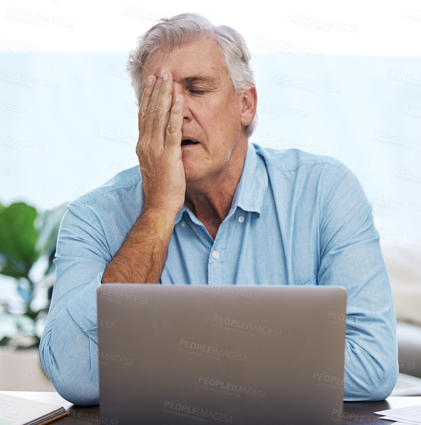 Buy stock photo Mature, businessman and tired with laptop in home office for stress, overworked and burnout in workplace. Male freelancer, technology and unhappy for job, project deadline and mental health at desk