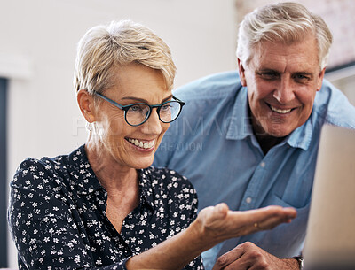 Buy stock photo Mature couple, laptop and smiling with excited for retirement, vacation and holiday at home. Woman on computer, man and choices for destinations for trip, browsing and planning in living room