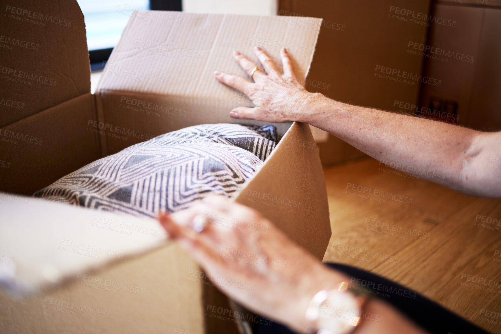 Buy stock photo Mature hands, unpacking and open box for moving, new home and tenant in apartment, rent and person. House, homeowner and check of cardboard in property, real estate and purchase with loan or mortgage