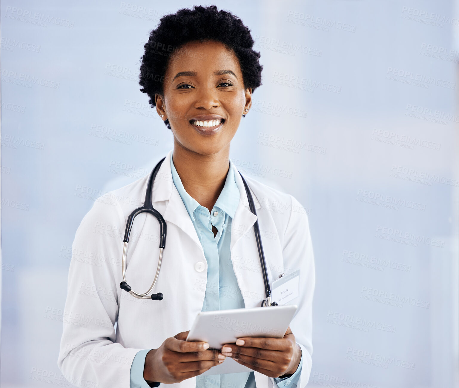Buy stock photo Portrait, black woman or doctor smiling with tablet in hospital for results, research and medical advice. Technology, female person or healthcare worker in clinic for patient care or online check