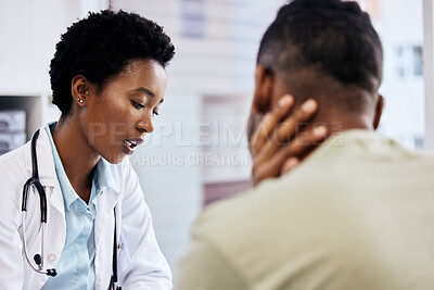 Buy stock photo Cropped shot of an attractive young female doctor doing  consult with an unrecognizable male patient in her office