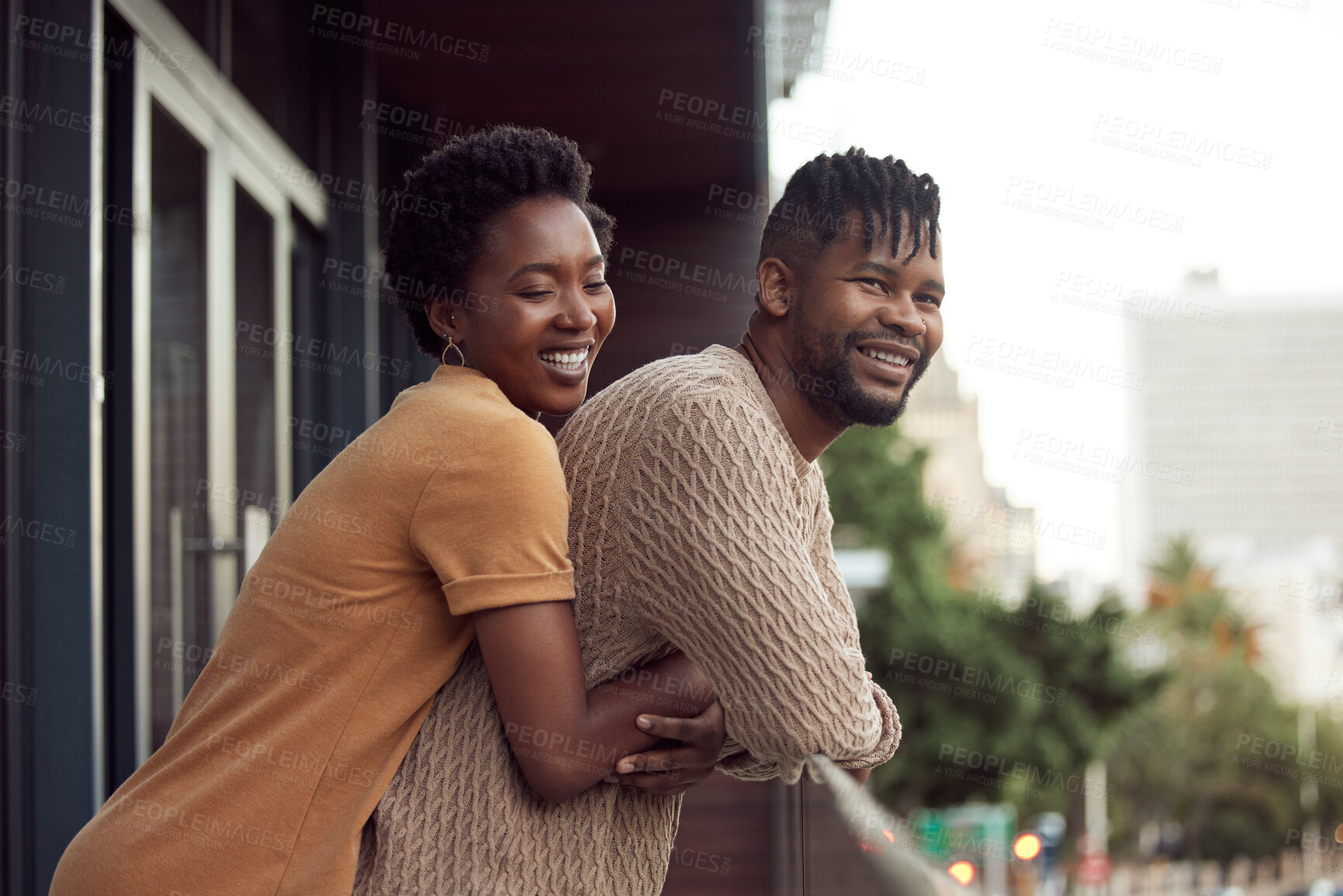 Buy stock photo Smile, balcony or black couple hug to relax in villa on holiday vacation together with home, support or view. Happy, city or romantic man with African woman with care, commitment or love in marriage
