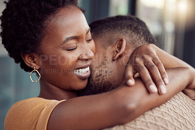 Buy stock photo Shot of a young woman bonding with her boyfriend outdoors