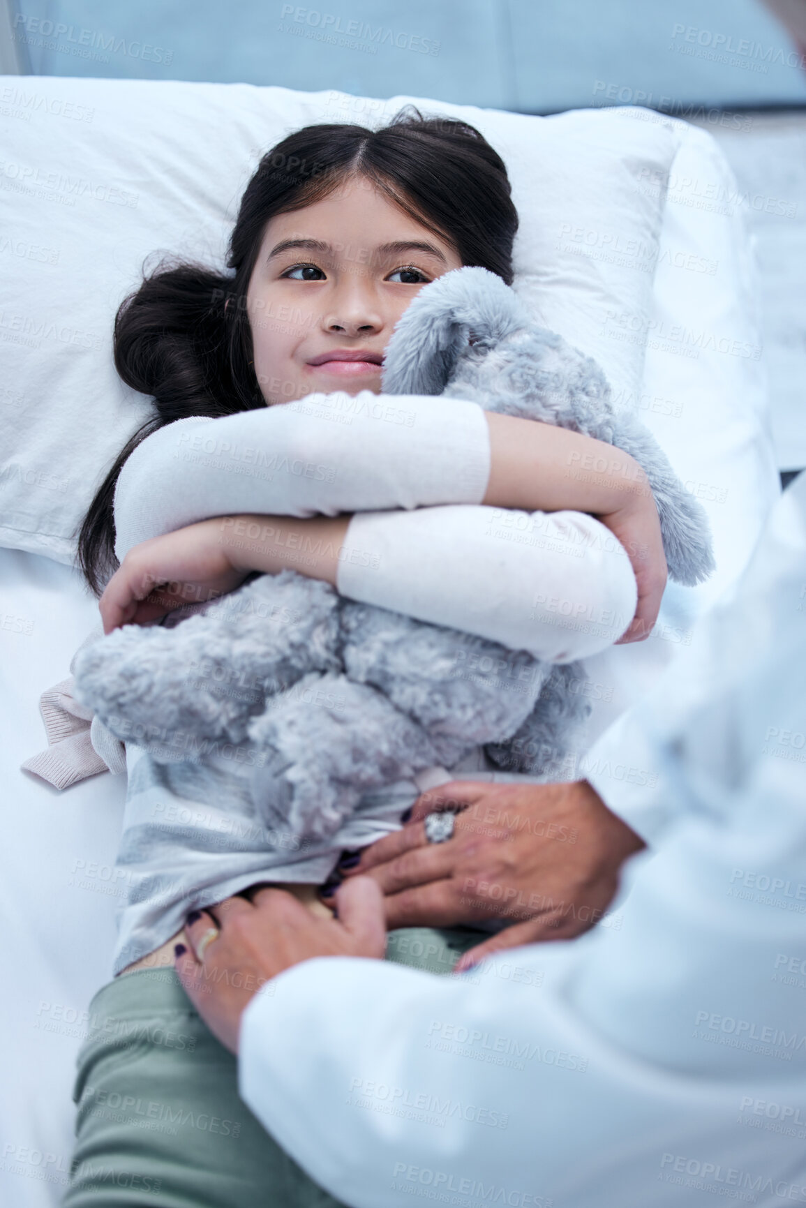 Buy stock photo Shot of a little girl getting a checkup at the clinic