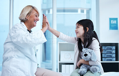 Buy stock photo Shot of a little girl getting a checkup at the clinic