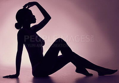 Buy stock photo Studio shot of a unrecognizable woman posing against a pink background black background