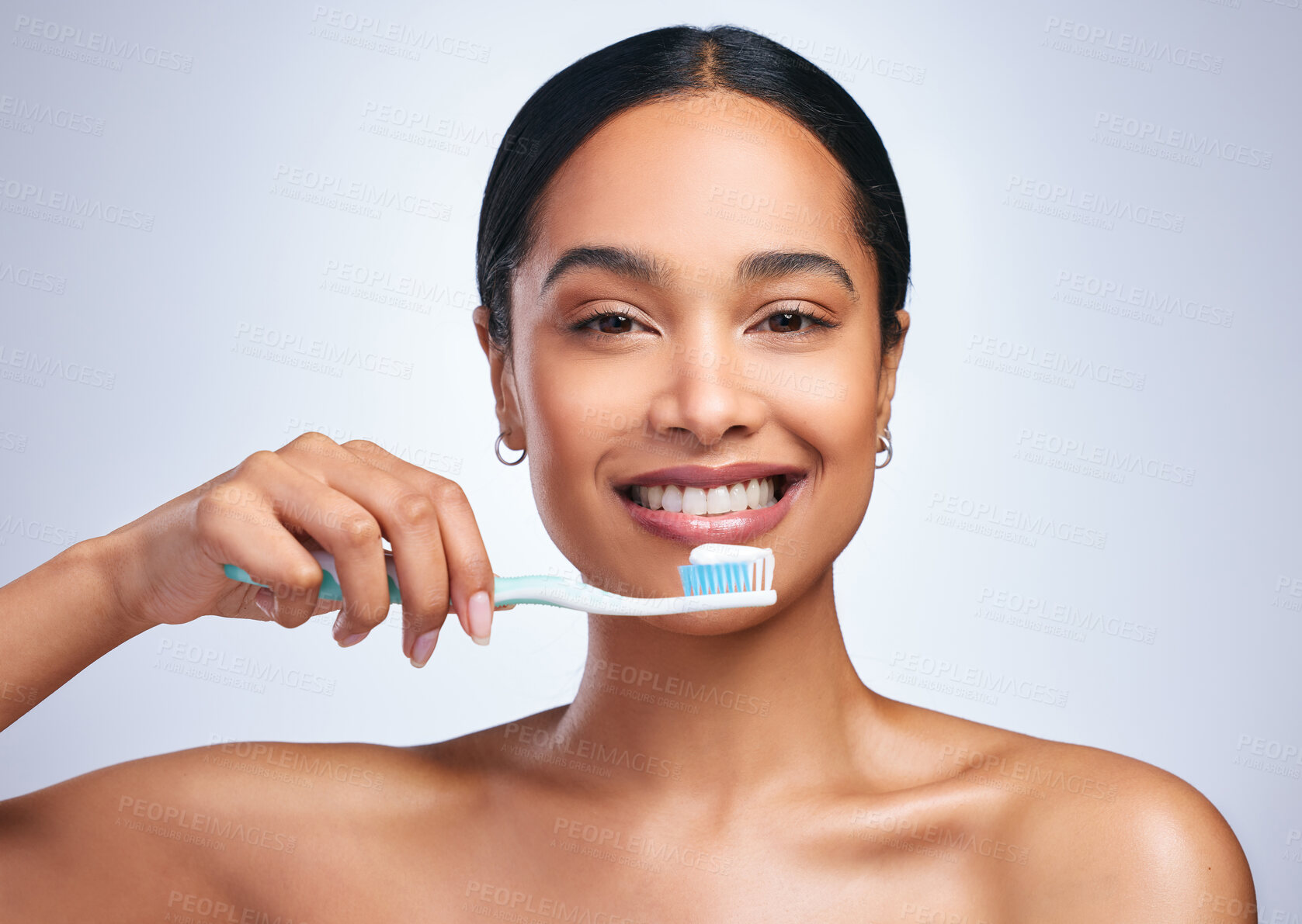 Buy stock photo Woman, brushing teeth and studio portrait with smile for self care, dental wellness or health by white background. Girl, dentistry model and toothbrush with toothpaste, product and happy for cleaning