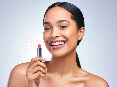 Buy stock photo Cosmetics, lipstick and woman in portrait for beauty, makeup and facial product in grey studio background. Female person, happy or dermatology with pink lips for confidence, make over and glamour