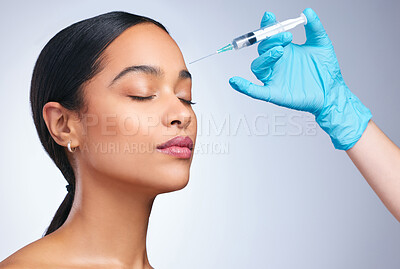 Buy stock photo Woman, studio and gloves for injection, surgery or cosmetics for skin, facial or collagen by white background. Girl cosmetic surgeon and filler on face, needle or hands for beauty, skincare or change