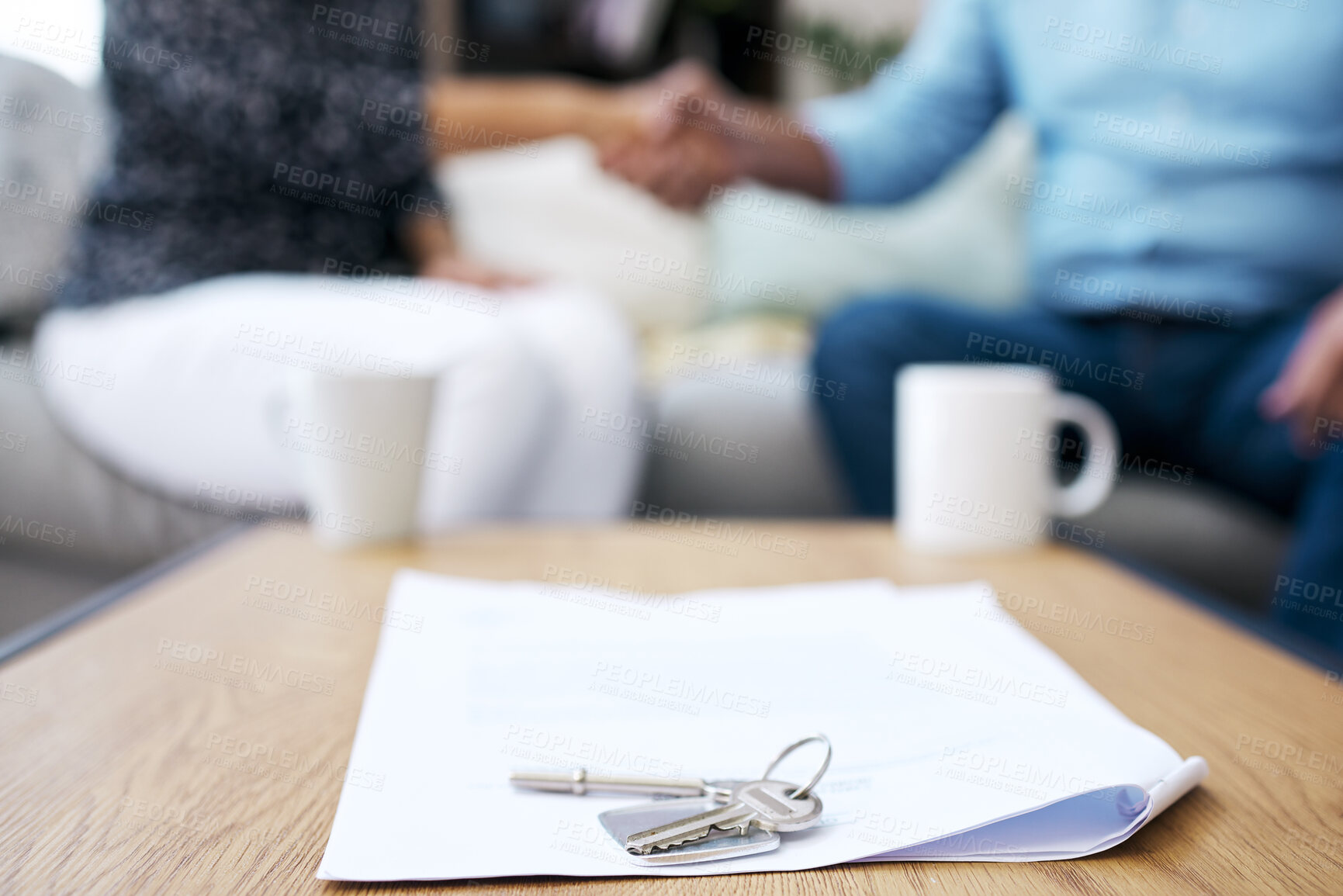 Buy stock photo Shot of two unrecognizable people shaking hands after a successful deal