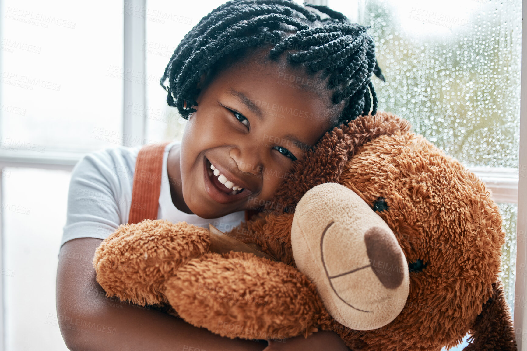 Buy stock photo Black girl, portrait and teddy bear in house by window for smile, wellness and playing with toys. Homeless child, happy and stuffed animal in orphanage or children home for love, friendship and hug