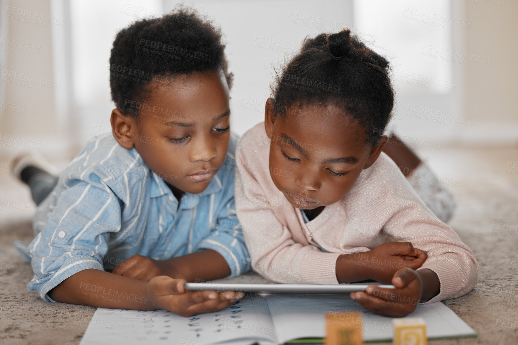 Buy stock photo Tablet, siblings and black children on floor in home, learning or watch funny cartoon of family bonding together. Technology, kids and education in bedroom on internet for streaming, app and game