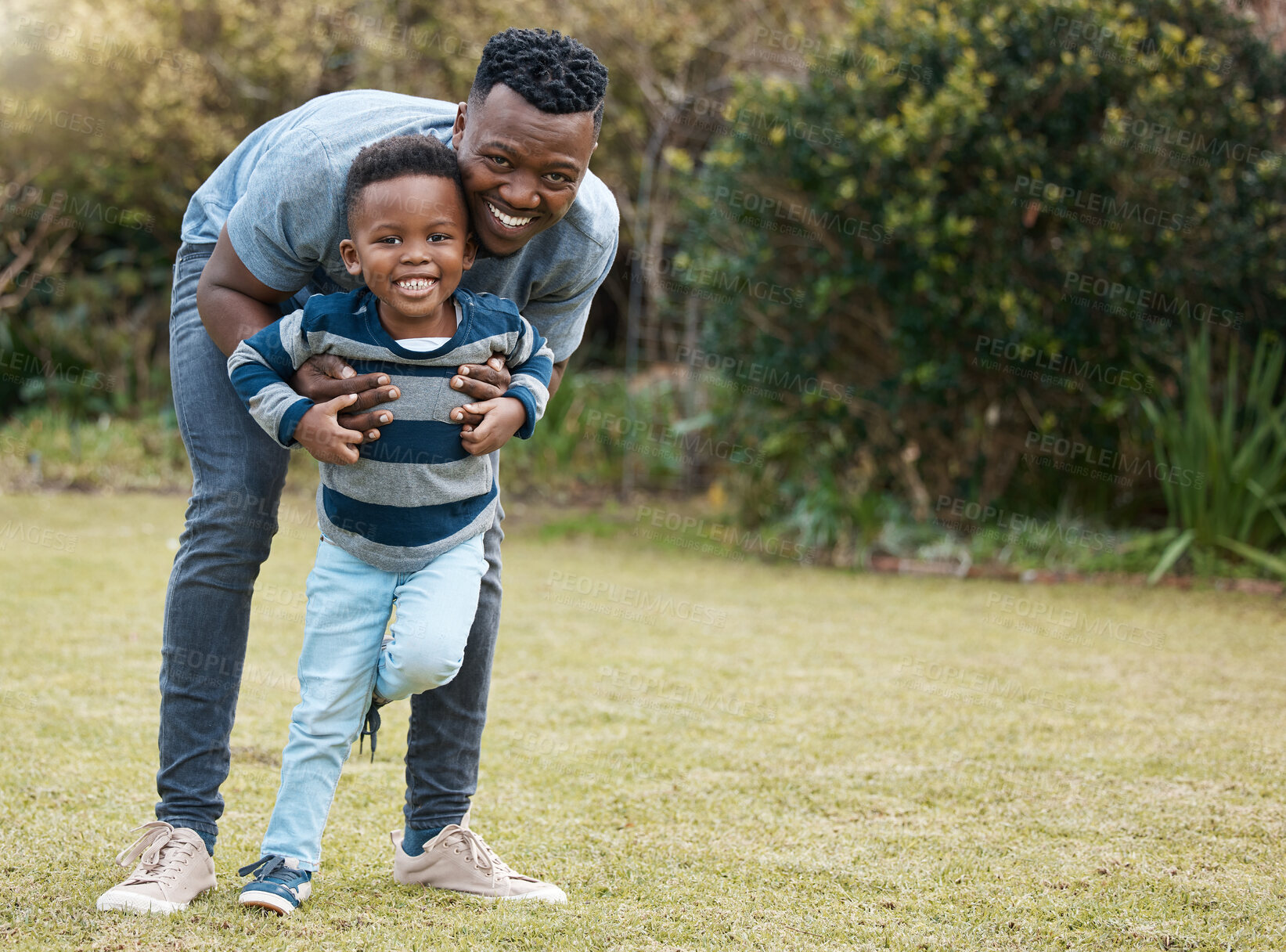 Buy stock photo Hug, father or portrait of child in park for support in nature for care, safety or bonding together to relax. Smile, love or single parent man with kid for security, playing or growth in black family