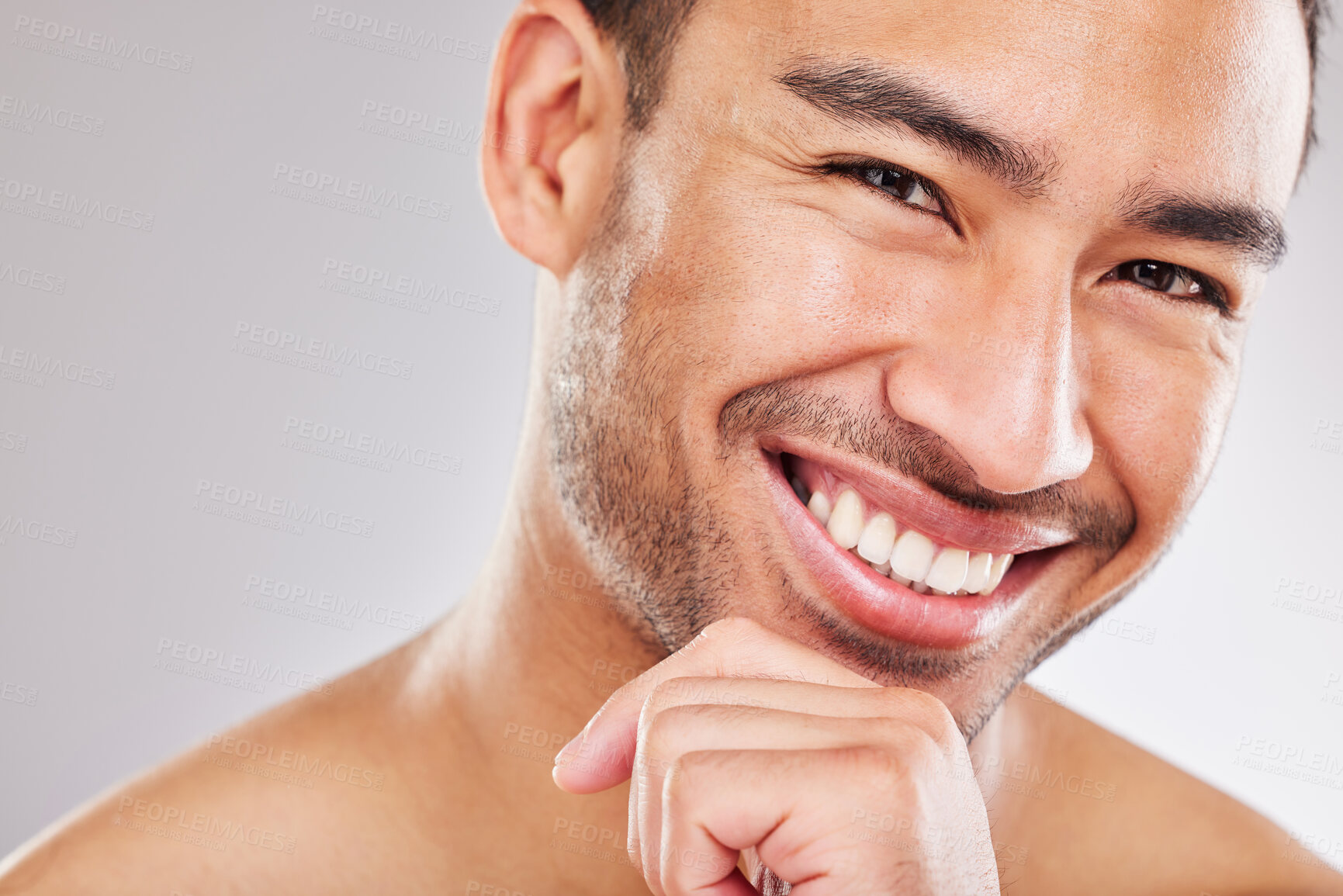 Buy stock photo Portrait, skincare and man with cosmetics, smile and dermatology on white studio background. Face detox, person and model with confidence, beauty and grooming routine with shine, glowing and wellness