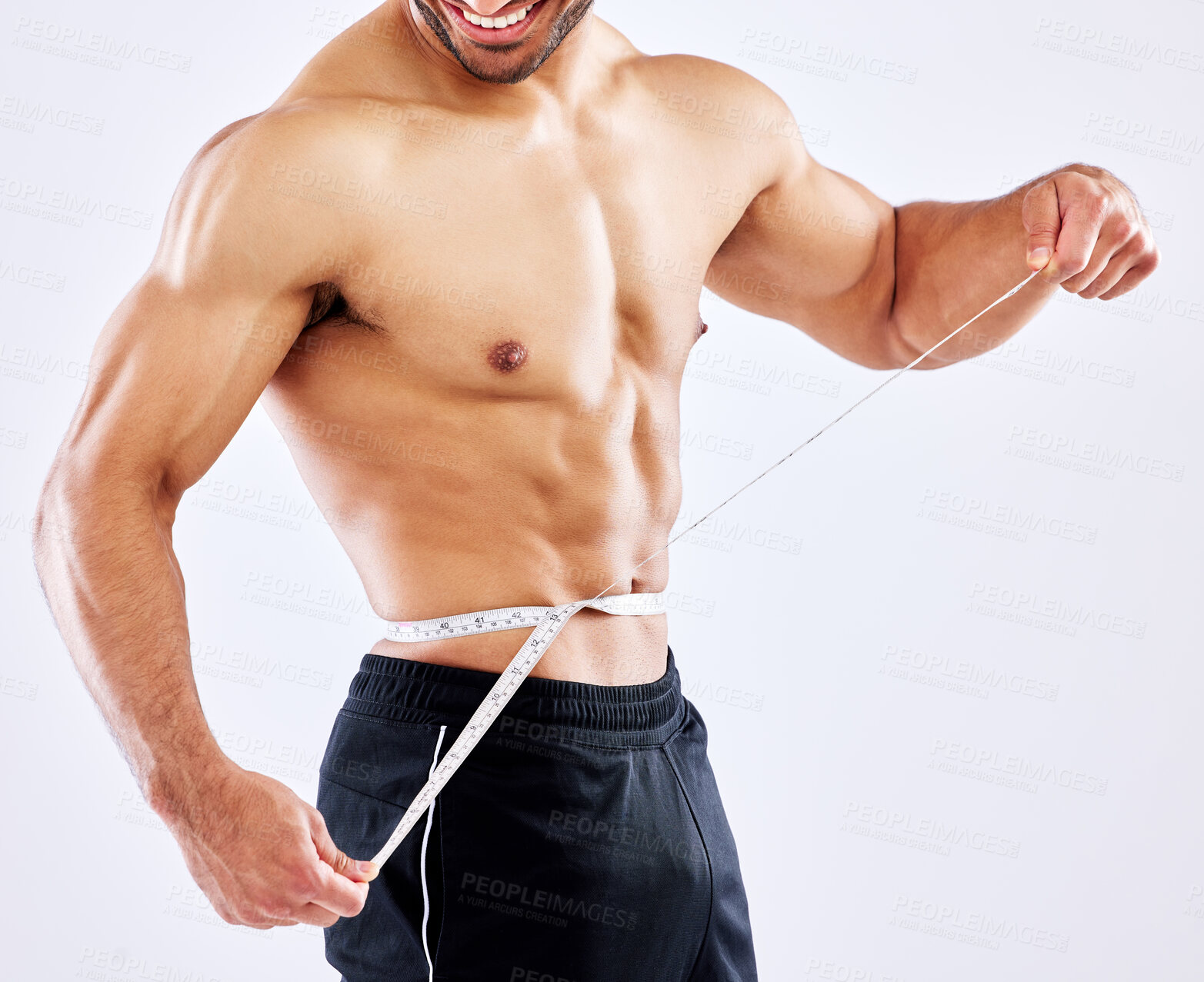 Buy stock photo Man, muscle and measuring tape for diet as bodybuilder in competition, strength and wellness on studio backdrop. Healthy, male person and fitness for results, workout and exercise in white background