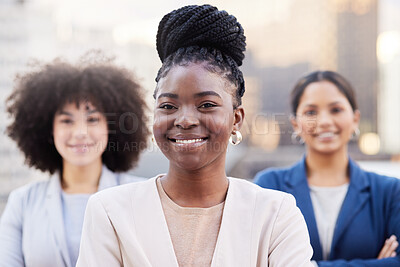 Buy stock photo Shot of a diverse group of businesswomen standing together on the balcony outside