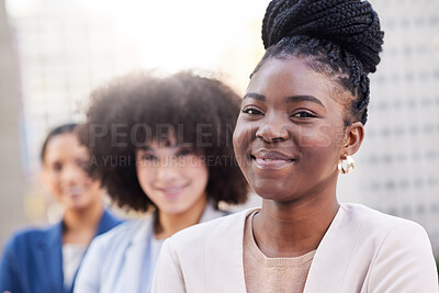 Buy stock photo Shot of a diverse group of businesswomen standing together on the balcony outside